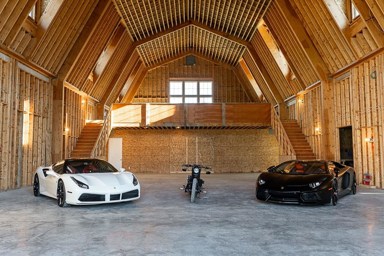 Grace Acres barn — timber framing close up, twin staircases, polished concrete floor