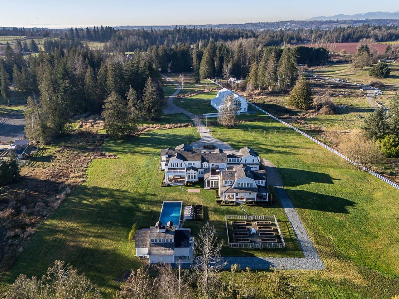 Grace Acres full compound aerial — mountain views, pool, barn, vegetable garden, Langley BC