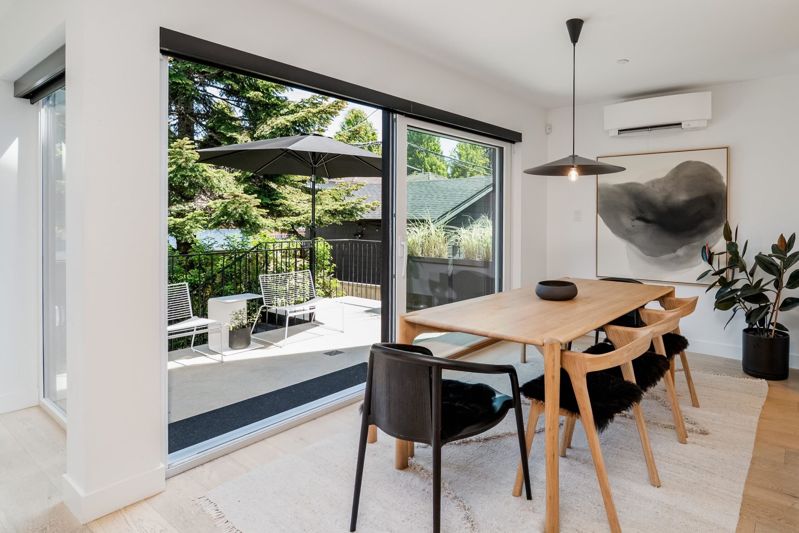 Dining room at 5208 Ross Street, 12'7 by 8'0, opening toward the patio and private garden