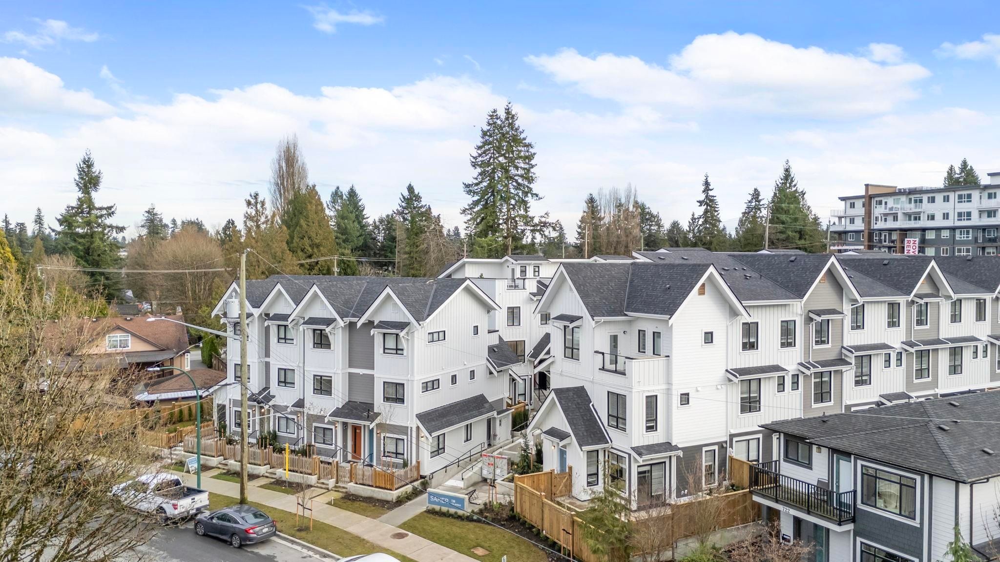 Aerial drone view of Samer by Domus Homes townhome complex at 728 Lea Avenue, Burquitlam, Coquitlam — brand new white and grey townhome buildings
