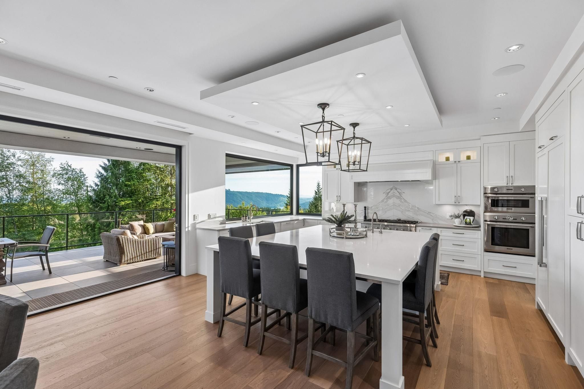 Kitchen island detail with pendant lighting at 2051 Ridge Mountain Drive, Anmore