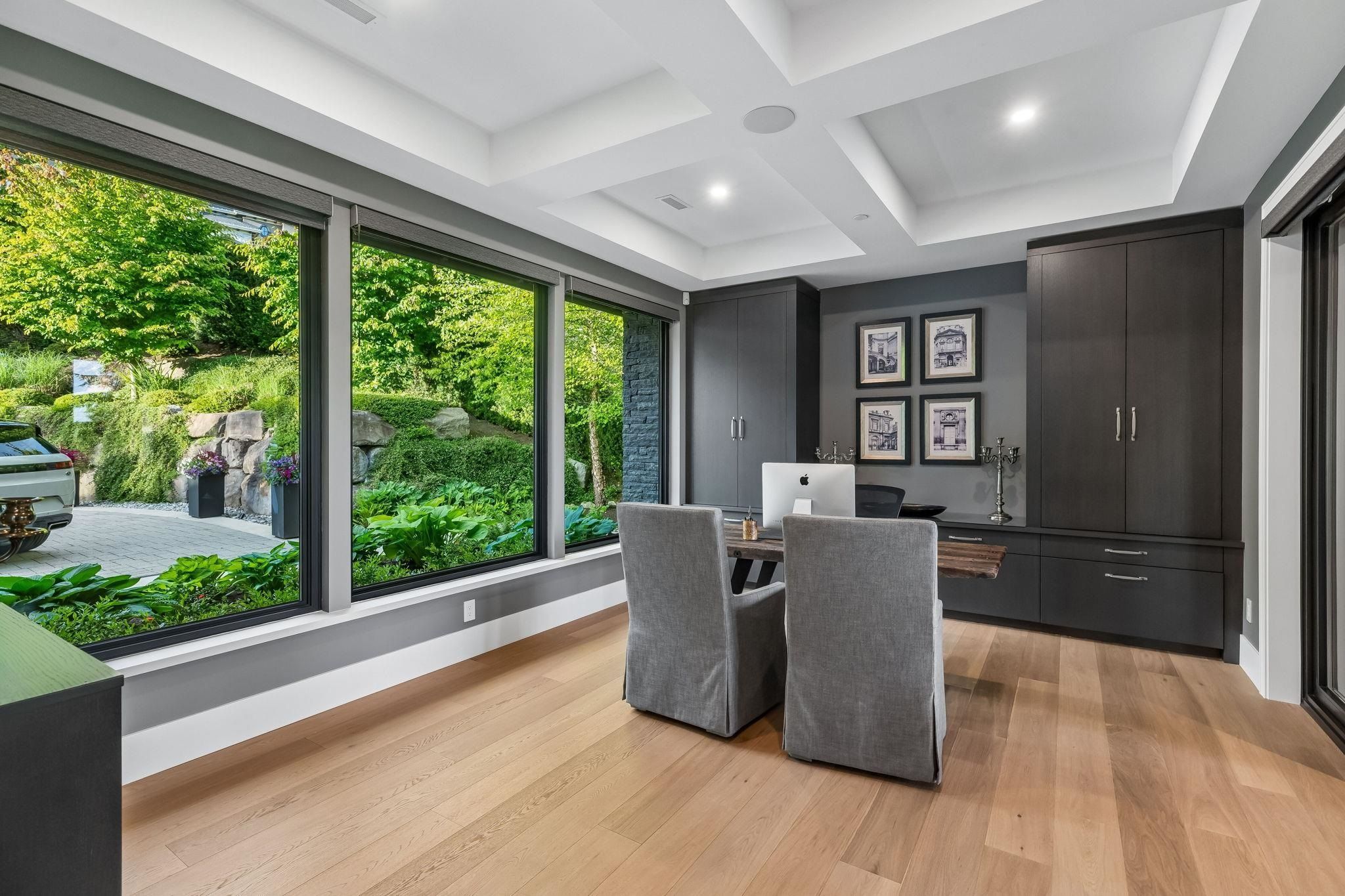 Home office with built-in shelving at 2051 Ridge Mountain Drive, Anmore