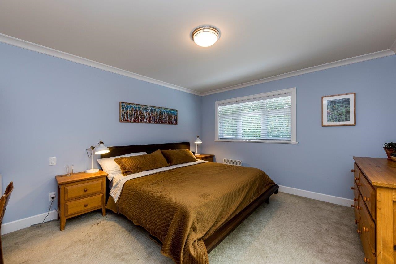 Upper-floor bedroom in this Lynn Valley home