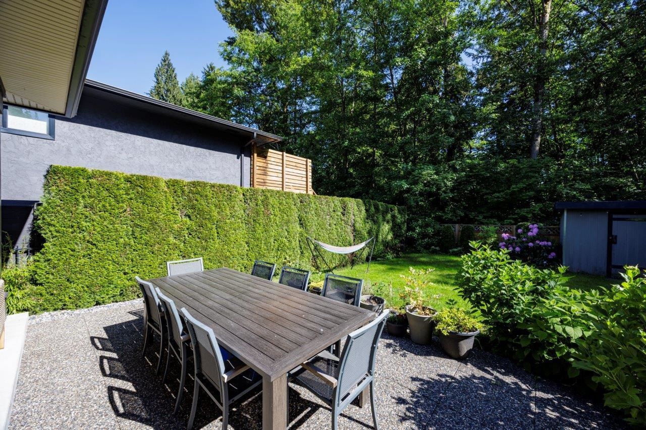 Backyard of this Lynn Valley home, backing onto Hastings Creek