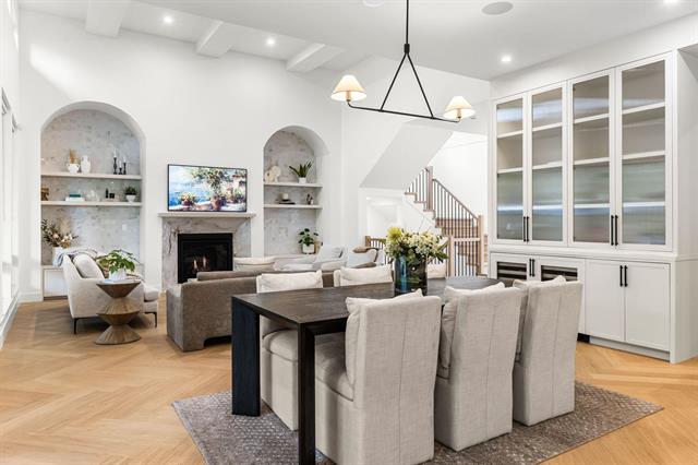 Dining room with herringbone hardwood floors at 944 Caithness Crescent, Glenayre
