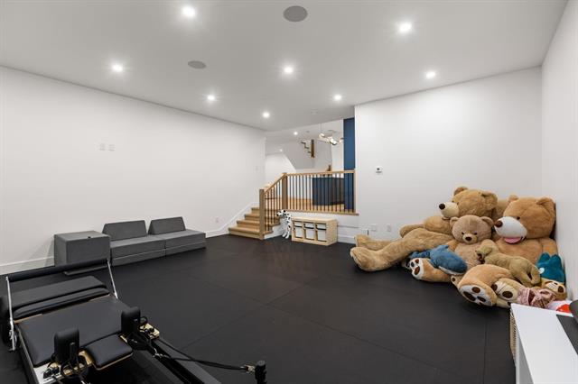 Flex room currently set up as a home gym at 944 Caithness Crescent, Glenayre