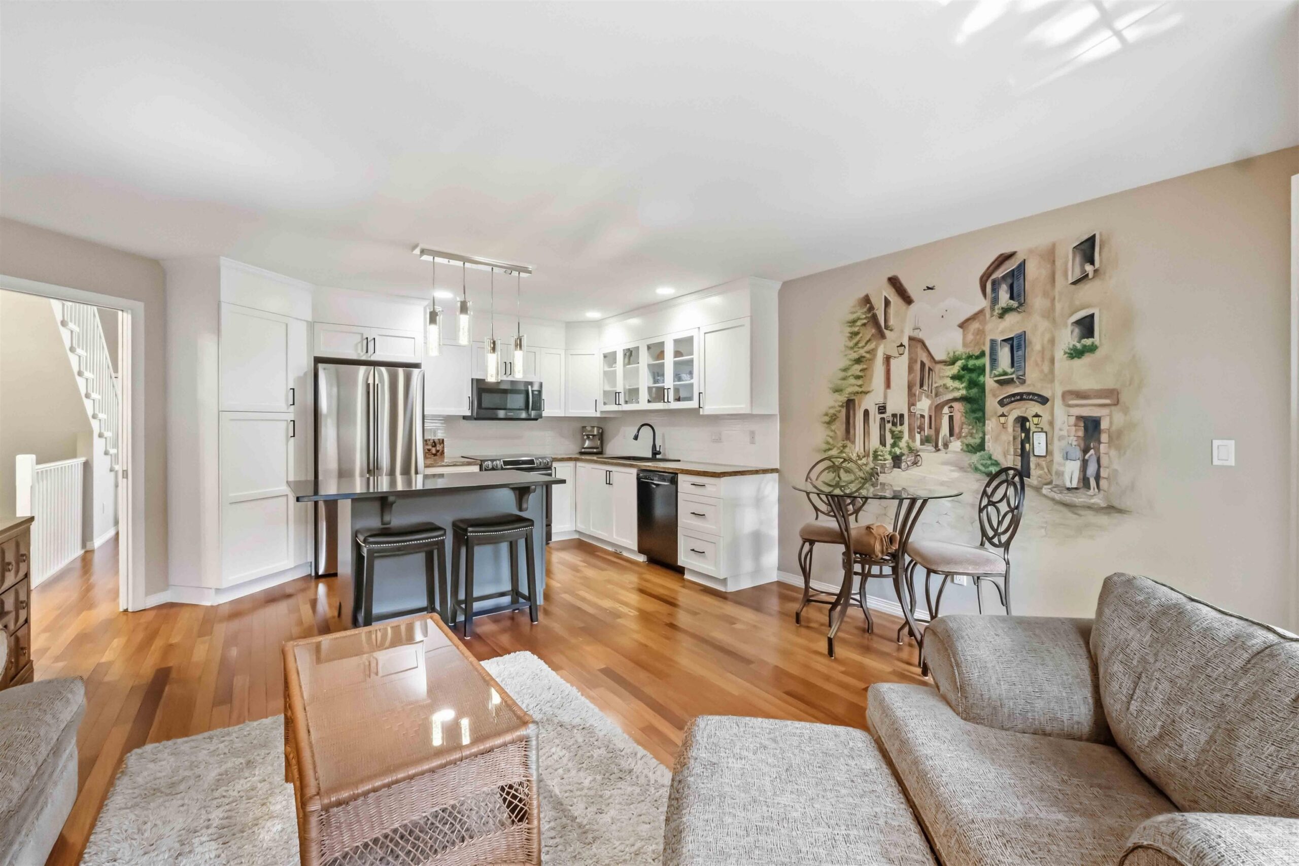 Open kitchen and eating nook beside the family room in 3-16995 64th Avenue, Cloverdale