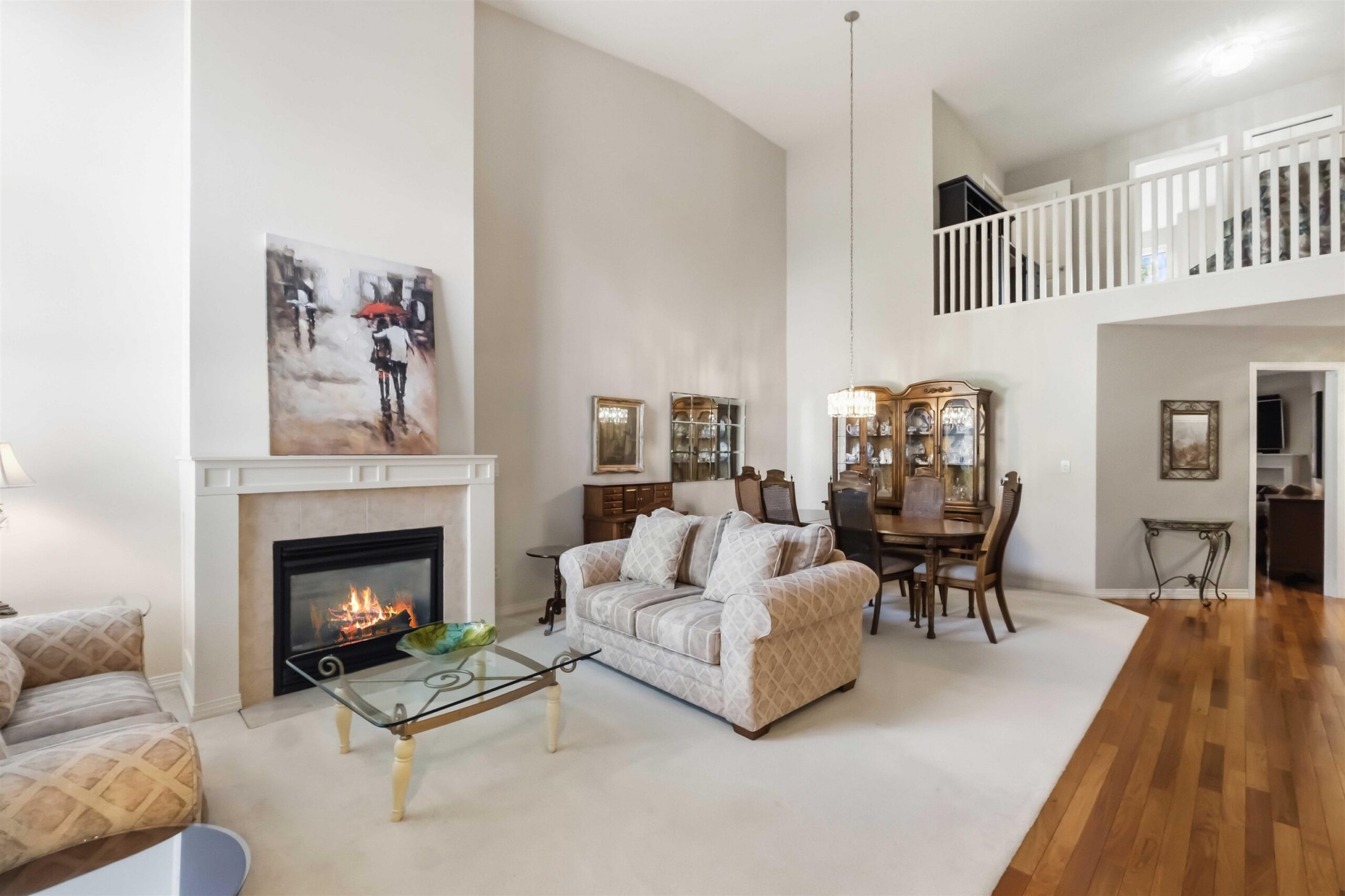 Living room with vaulted ceiling and gas fireplace in 3-16995 64th Avenue, Cloverdale