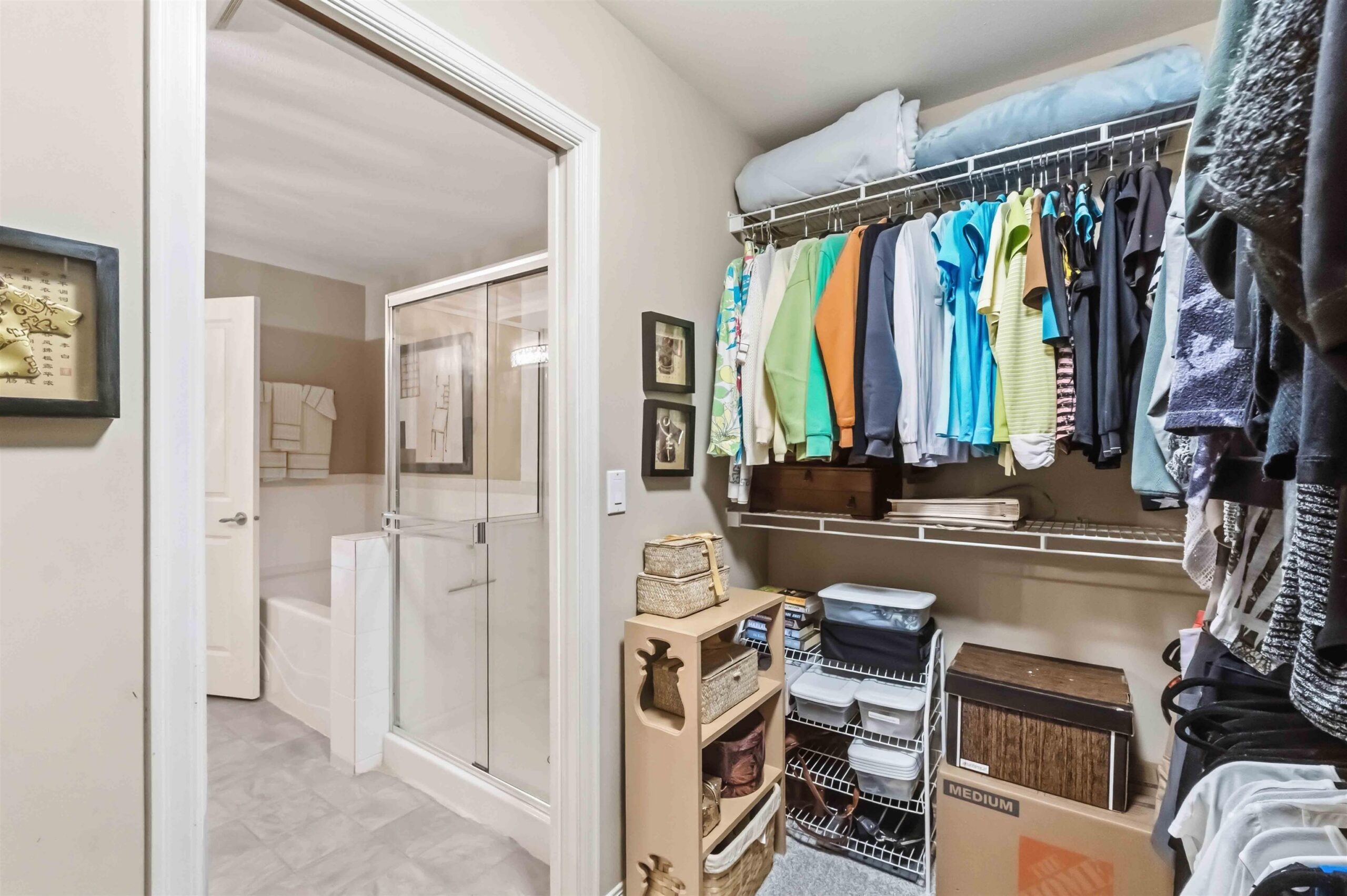 Walk-in closet off the primary ensuite in 3-16995 64th Avenue, Cloverdale