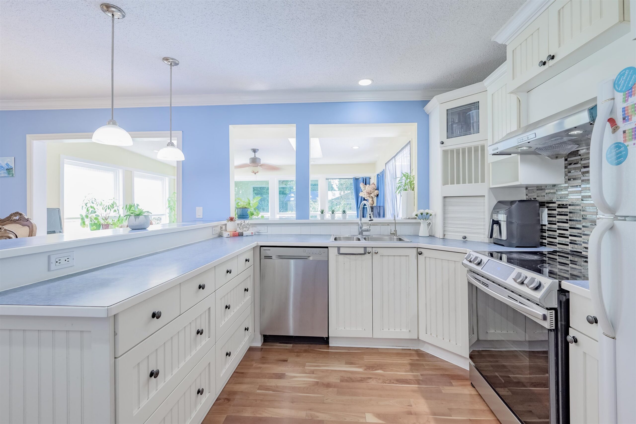 Renovated kitchen with shaker-style cabinets in Oxford Heights Port Coquitlam home