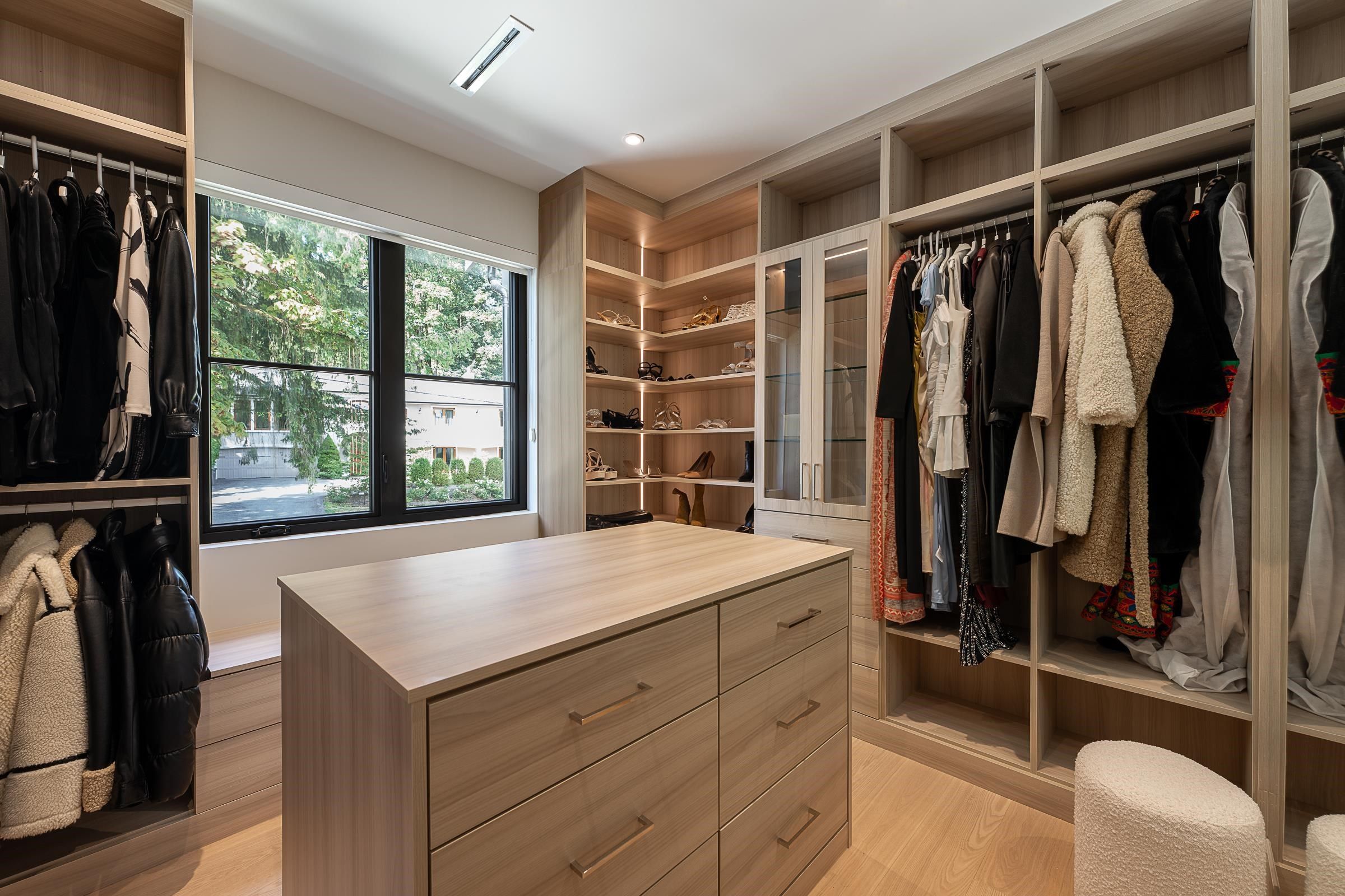 Primary walk-in dressing room with centre island at 2976 Lazy A Street, Ranch Park