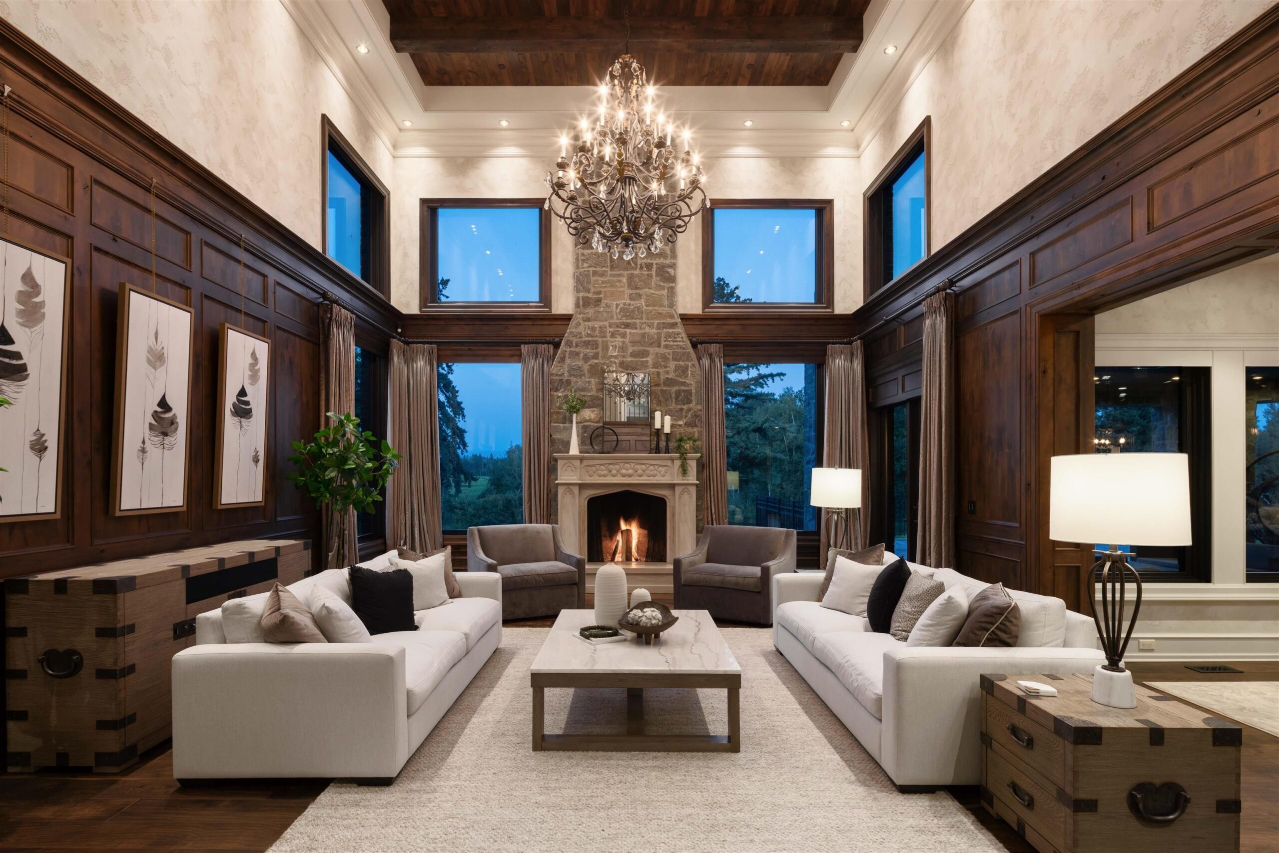 Two-storey great room with stone fireplace at Tannin Manor