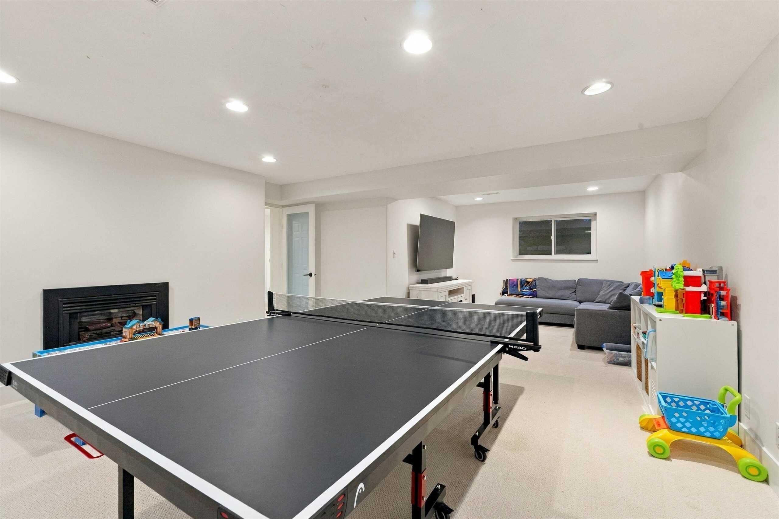 Lower-level games and recreation room in renovated Coquitlam split-level home
