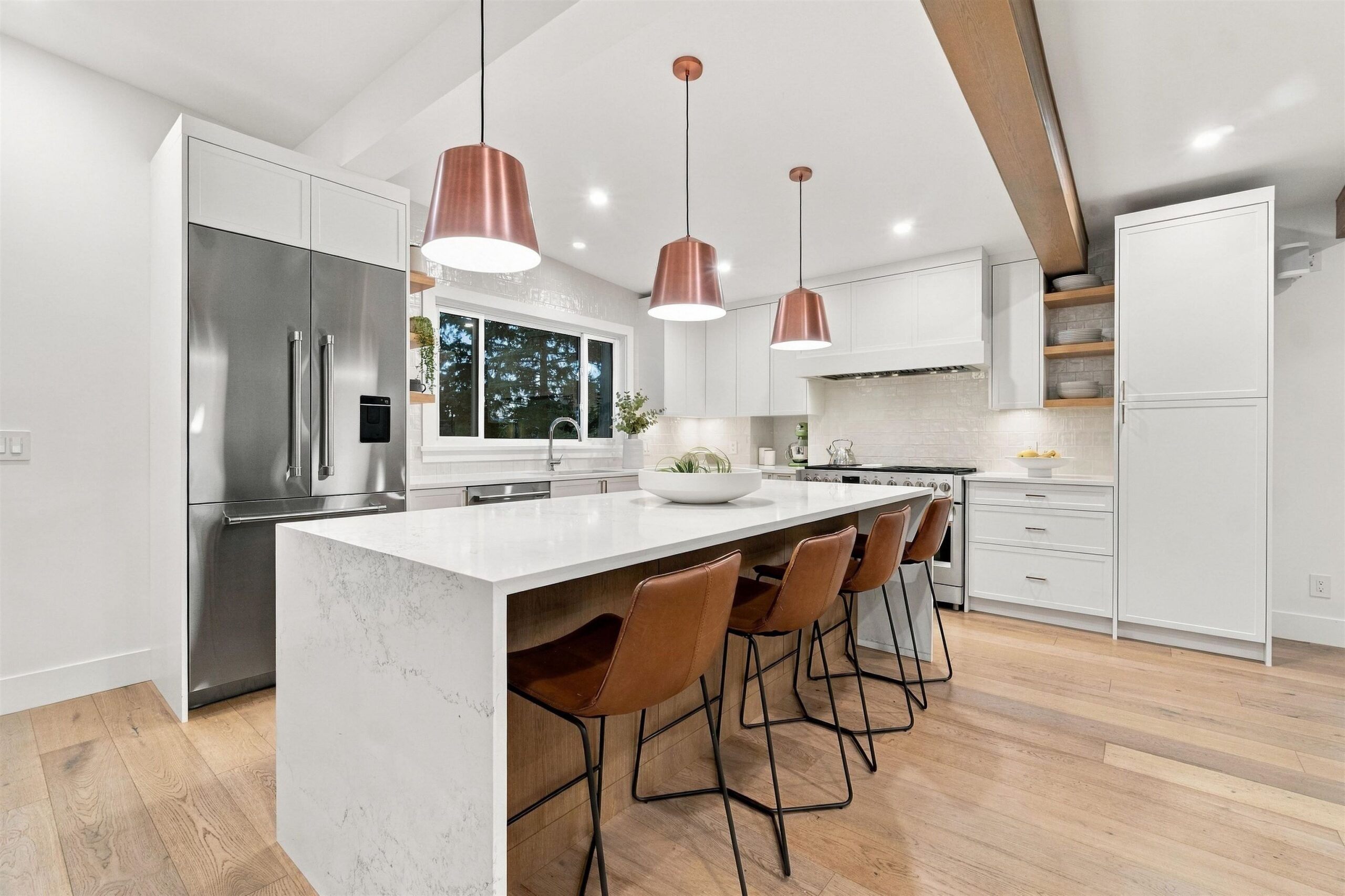 Renovated chef’s kitchen with large island and premium appliances at 2957 Starlight Way