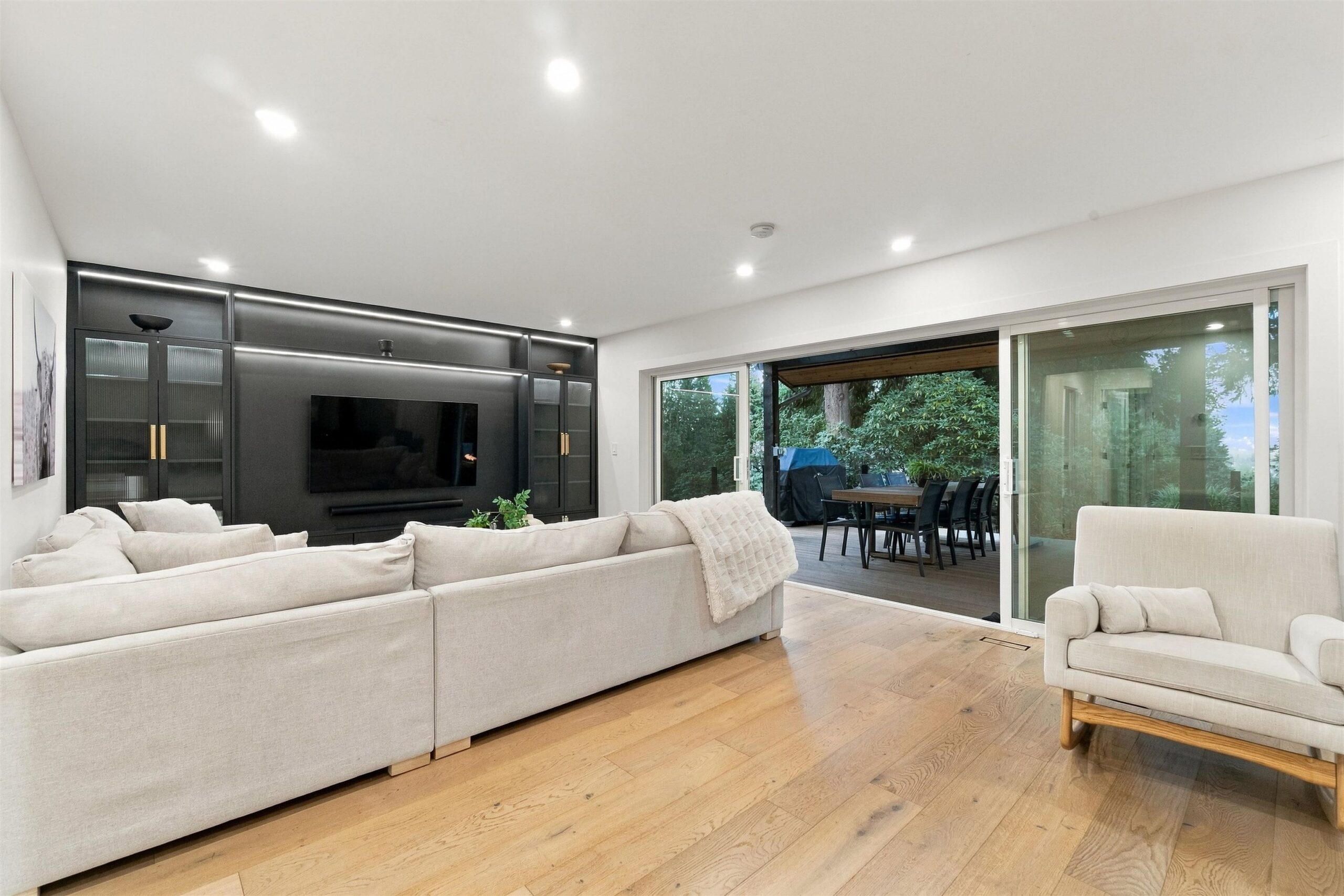 Family room opening to the deck and patio at 2957 Starlight Way Coquitlam
